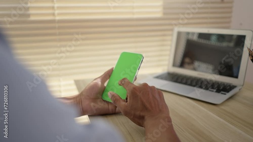 Close-Up of Hand Touching Smartphone Screen, Modern Communication Technology, Touch the phone screen, Phone green screen, Go on internet.