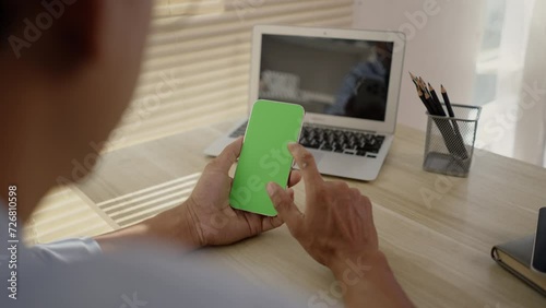 Close-Up of Hand Touching Smartphone Screen, Modern Communication Technology, Touch the phone screen, Phone green screen, Go on internet.