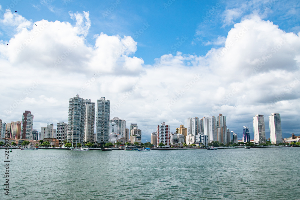 Obraz premium Blue Skies and City Skyline Along Coast of Santos Sao Paolo Brazil