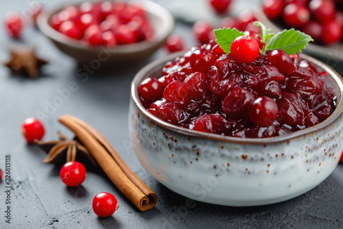 cranberry with a sour taste and a red color in a sauce with sugar and spices