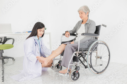 smart asian doctor holding leg and assessment symptoms of old stroke patient in hospital, elderly rehabilitation clinic, they training to rehab muscle, replacement of knee osteoarthritis