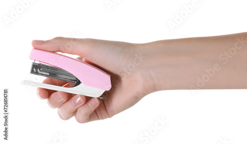 Woman holding pink stapler on white background, closeup