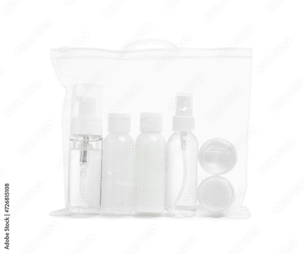 Cosmetic travel kit in plastic bag isolated on white. Bath accessories Cosmetic travel kit in plastic bag isolated on white. Bath accessories