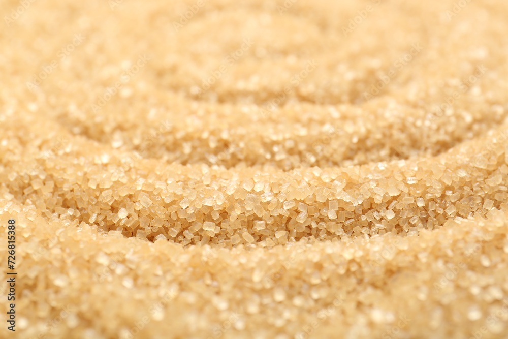 Granulated brown sugar as background, closeup view Granulated brown sugar as background, closeup view