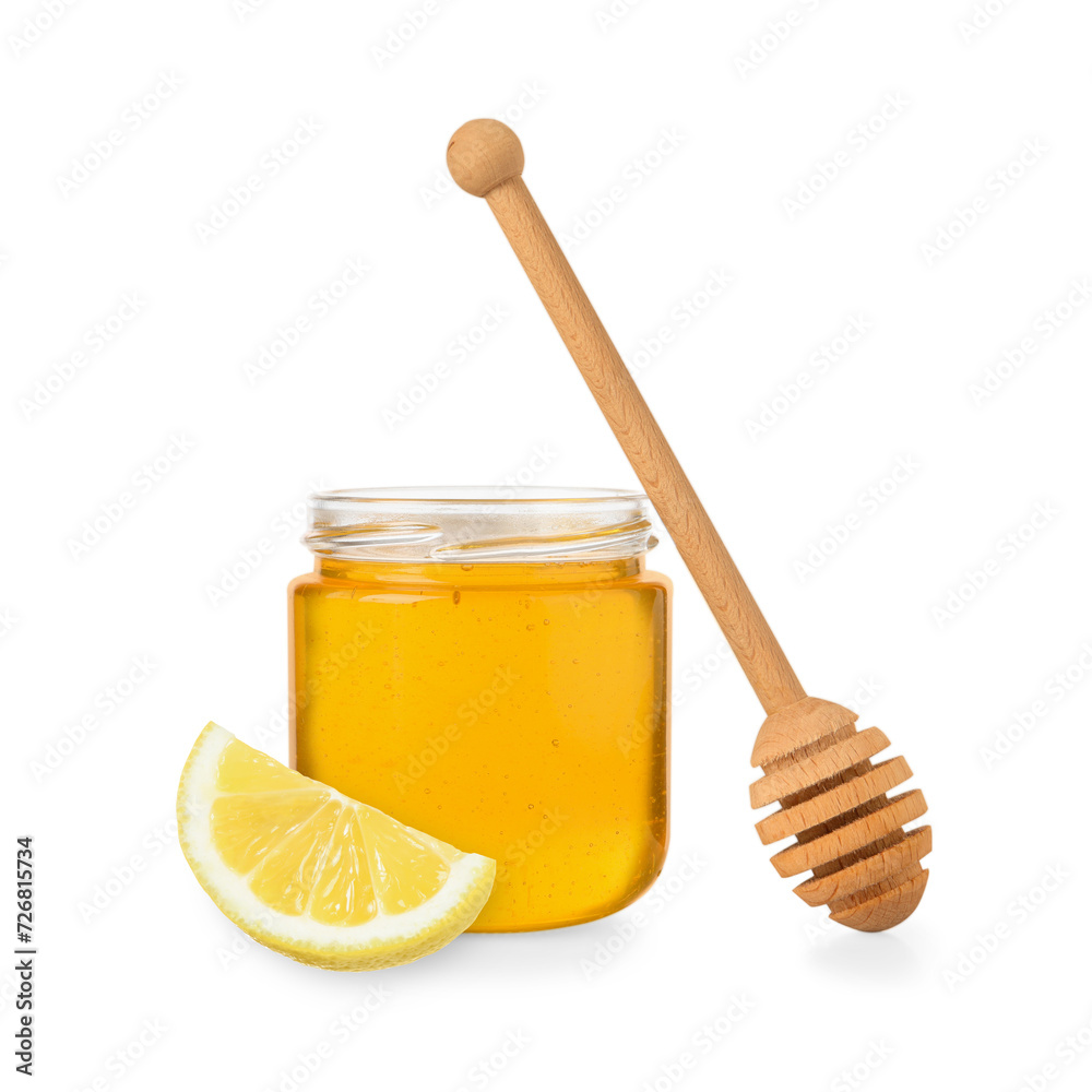 Honey in glass jar, dipper and lemon isolated on white