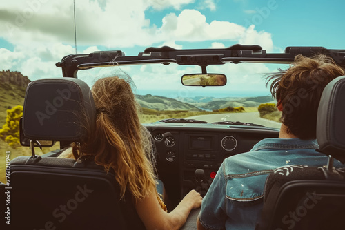 man and a woman enjoying a scenic drive, with the windows down and the wind in their hair