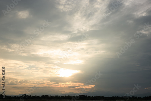 Sky during overcast  storm at evening. Include many gray clouds  empty space  light nature  sunset sunrise  horizon skyline  land or landscape at outdoor for background. Concept of disaster  danger.
