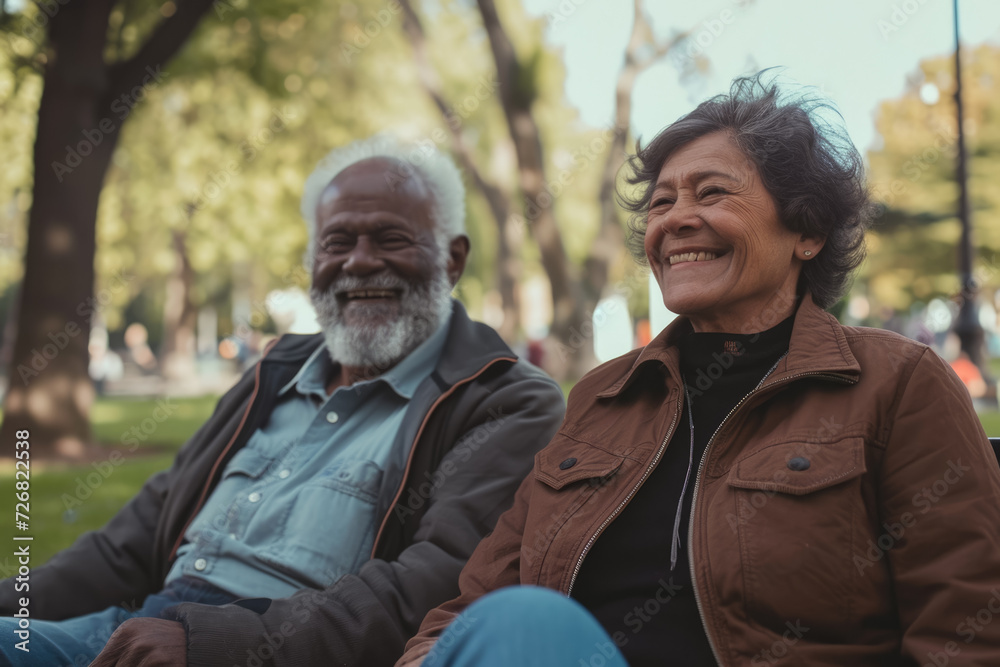man and a woman sitting on a park bench, with a look of contentment on their faces