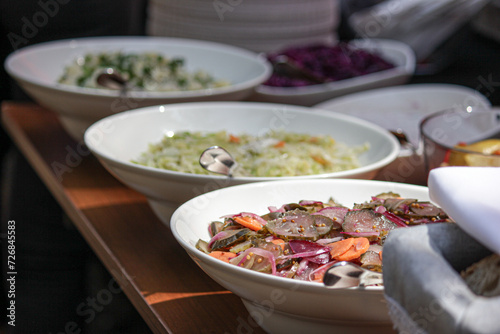 vegetable salads, Preparation of dishes for an all-inclusive banquet in a resort hotel. Empty all inclusive line, restaurant equipment.