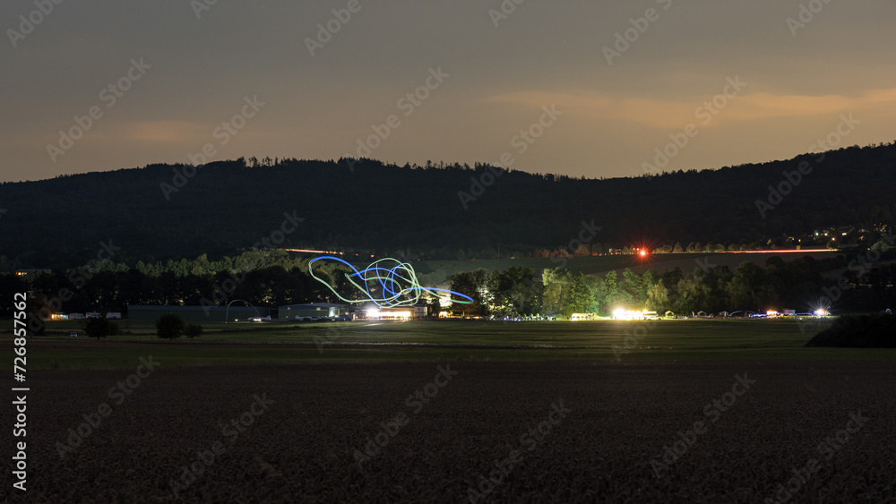 Flugshow bei Nacht beim Taunus Flugfest auf dem Flugplatz Neu-Anspach / Wehrheim Obernhain im Hochtaunuskreis, Hessen Flugshow bei Nacht beim Taunus Flugfest auf dem Flugplatz Neu-Anspach / Wehrheim Obernhain im Hochtaunuskreis, Hessen