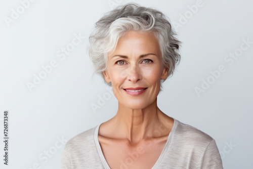 gorgeous 50s mid aged mature woman looking at camera 