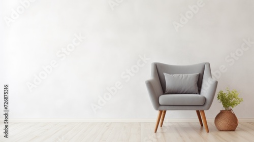 interior of living grey fabric armchair, wooden table on wooden floor 