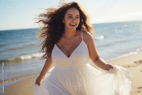 Young happy woman, chubby, 25 years old, in a white fluttering dress  © CStock