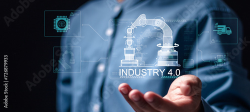 Smart industry 4.0 concept, Businessman touch virtual screen of physical system, smart industrial revolution, automation, robot assistants, iot, cloud and bigdata.