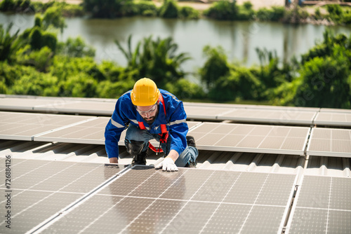 Wallpaper Mural Men technicians carrying photovoltaic solar modules on the factory roof. Engineers in helmets installing solar panel systems outdoors. Concept of alternative and renewable energy solar cell. Torontodigital.ca