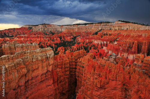 Spectacular, stormy late summer afternoon view of rock spires from Sunset Point, Bryce Canyon National Park, Utah, Southwest USA.