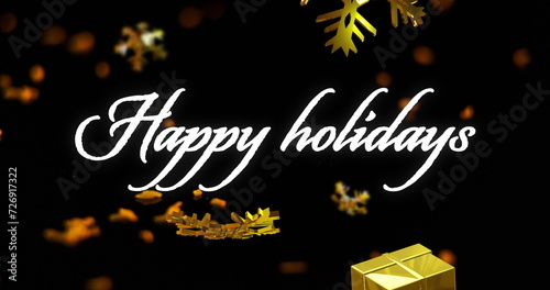 Image of happy holidays text over christmas decorations on black background