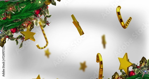 Image of candy canes and stars christmas decoration on white background