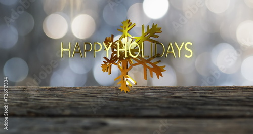 Image of happy holidays text over christmas snow flakes on spot lights background
