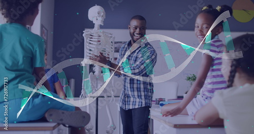 Image of dna strand over smiling african american male teacher showing pupils skeleton in class