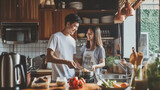 pareja de hombre y mujer asiática de pie desayunando en la cocina a primera hora de la mañana con luz natural preparando comida.