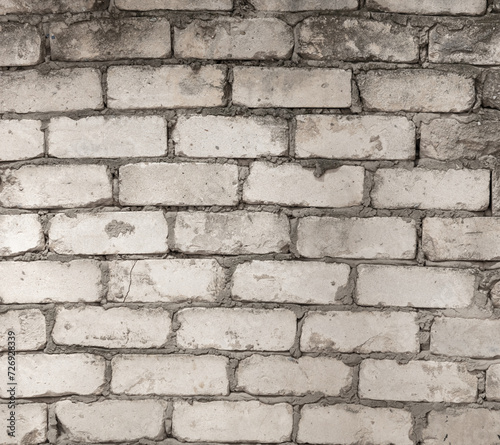 Old bricks in the wall as an abstract background. Texture