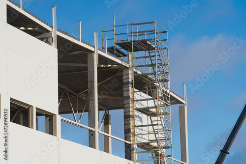 Scaffolding tower on blue sky background