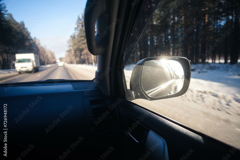 Cars driving along the road, view inside the car