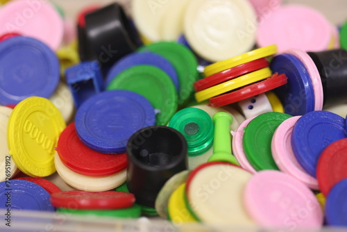 pegs and play coins meant for games like business, Chinese checkers, uno etc.,