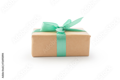 Brown paper gift box with green ribbon isolated on white