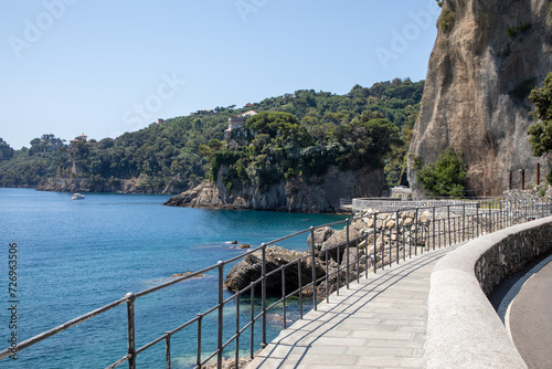 pedestrian path coastline pathway near road and coast in bay of Paraggi between Portofino and Santa Margherita Ligure