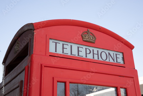 Old Red Telephone sign text and brand logo Booth London phone box