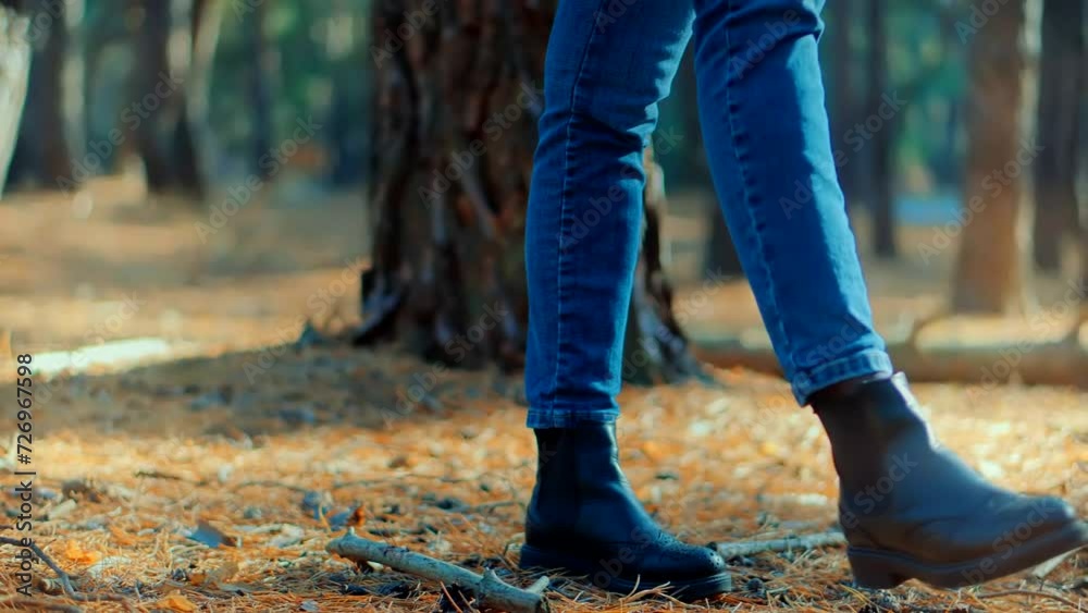 Walking on forest path woman enjoyed fresh air . Woodland in autumn fall Walking on forest path woman enjoyed fresh air . Woodland in autumn fall