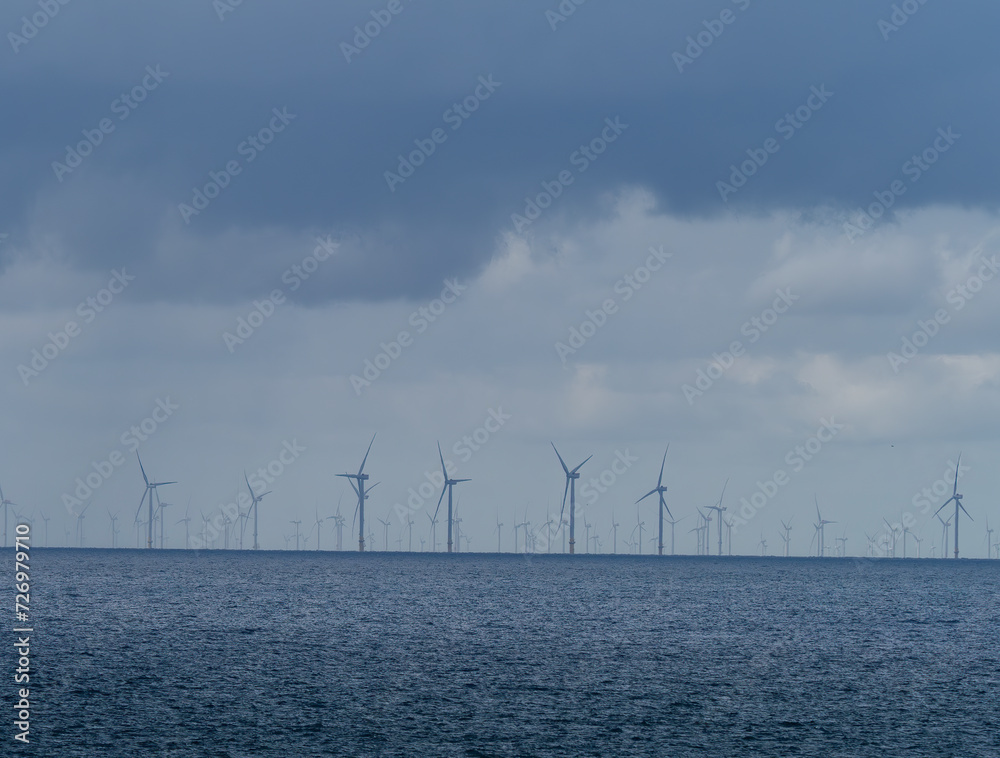 Obraz na plátně Offshore and Onshore Windmill farm Westermeerwind, Windmill park in the Netherla