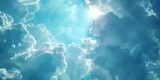 Serene sky with fluffy clouds and glimpses of sunlight, ideal for backgrounds and wallpapers. nature's beauty captured in daytime. AI
