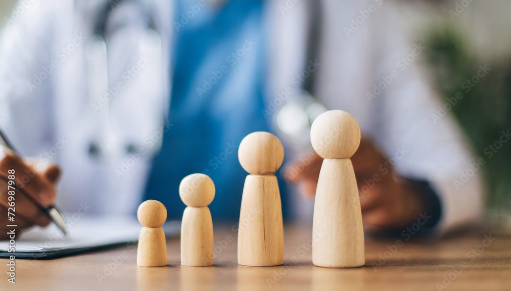 miniature wooden family figures on a doctor's table, symbolizing unity and healthcare support in a clinic or hospital setting miniature wooden family figures on a doctor's table, symbolizing unity and healthcare support in a clinic or hospital setting