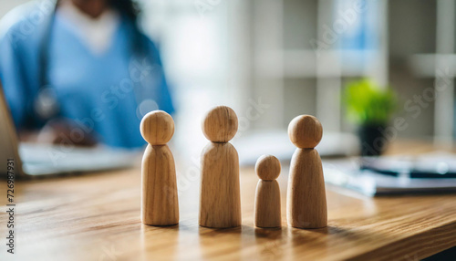 miniature wooden family figures on a doctor's table, symbolizing unity and healthcare support in a clinic or hospital setting