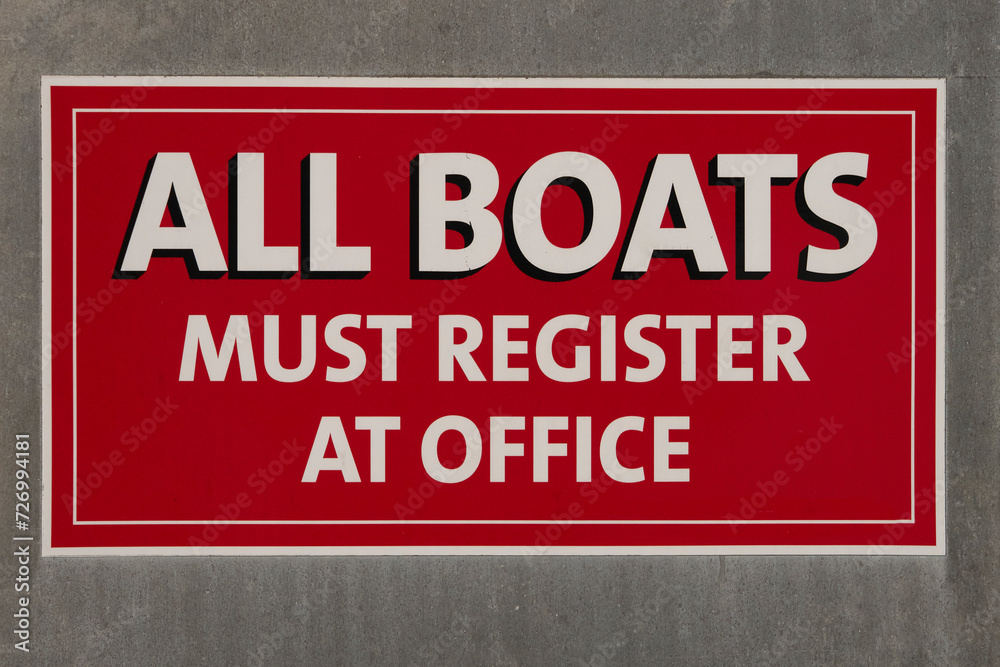 Red and white sign that states Red and white sign that states
