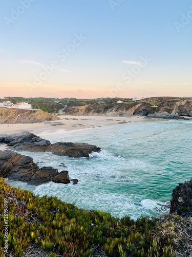 Rocky ocean coast at the sunset time, natural pastel colors