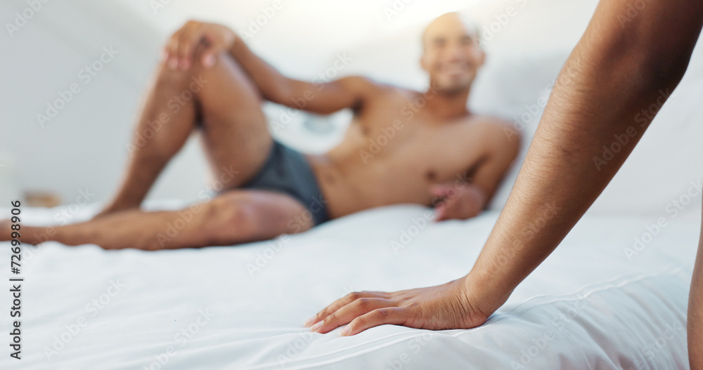 Couple, bed and hand with underwear on duvet for love, romance or intimacy in affection, morning or seduction at home. Closeup of woman, man or lovers lying in bedroom for compassion on anniversary - obrazy, fototapety, plakaty 