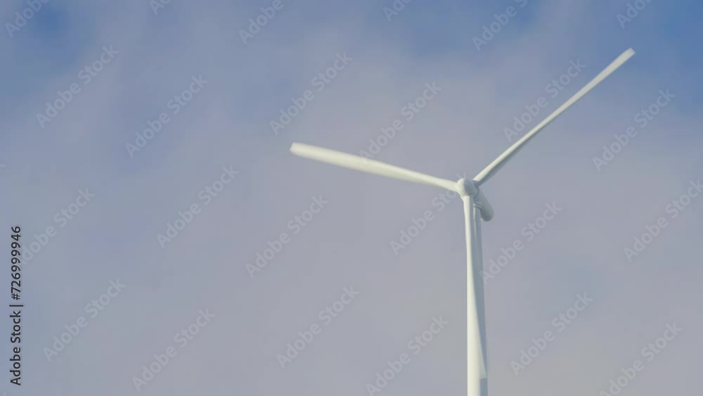 Close up view of a windmill against the sky. Looped video Close up view of a windmill against the sky. Looped video