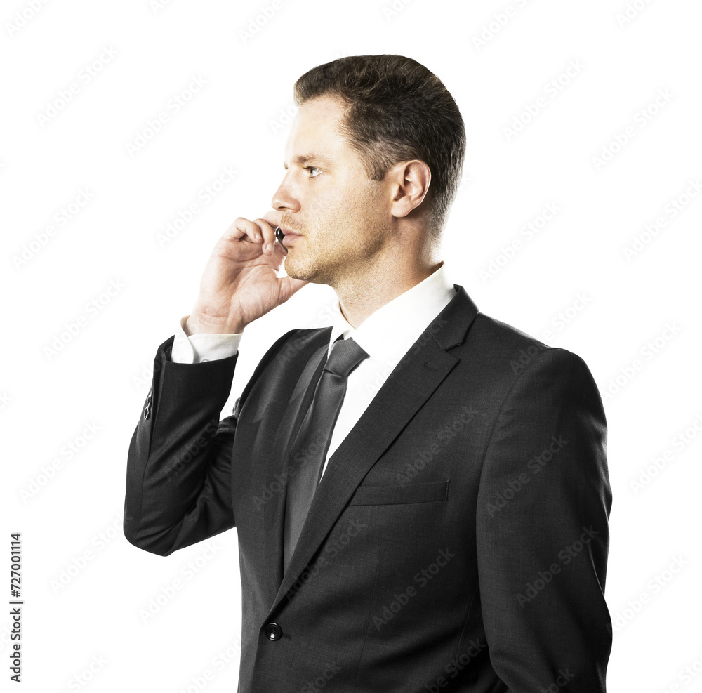 Businessman in a suit engaged in a phone conversation, isolated on white Businessman in a suit engaged in a phone conversation, isolated on white