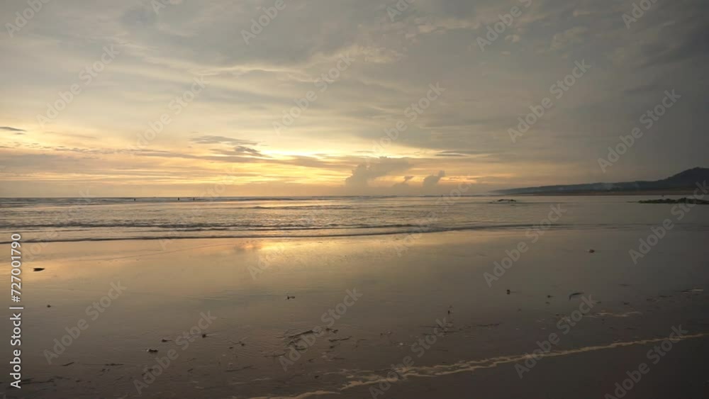 beautiful evening beach view before sunset with small waves on Cipatujah Tasikmalaya beach beautiful evening beach view before sunset with small waves on Cipatujah Tasikmalaya beach