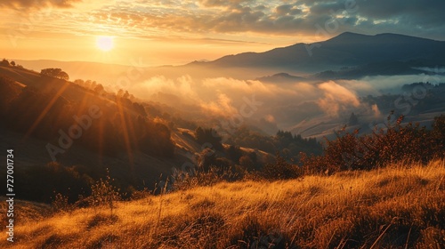 golden sky sunrise dramatic beautiful landscape mountain. Dawn sky gold dusk time cloudscape with sunlight. Dramatic sunset over mountain landscape. Beautiful landscape foggy hills twilight time