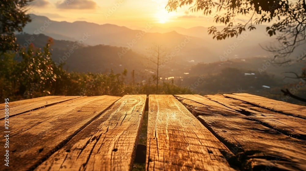Wooden table on blur mountain morning or evening view landscape, Warm feeling in orange or brown tones.