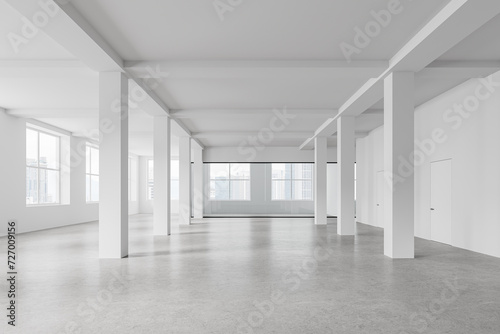 Stylish empty office interior and columns, panoramic window on skyscrapers
