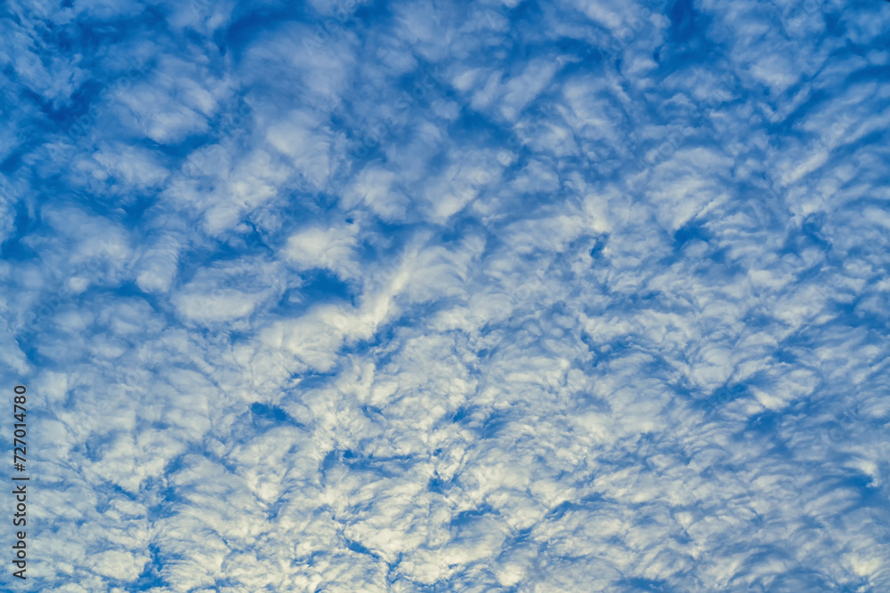 Beautiful waves of clouds against bright blue sky. Beautiful waves of clouds against bright blue sky.