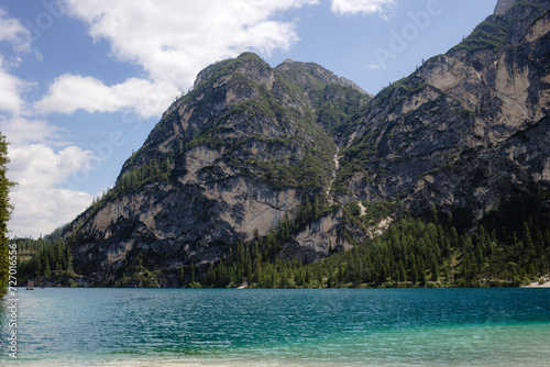Scenic Mountain Lake View with Clear Water and Green Trees. Nature Travel and Vacation Concept.