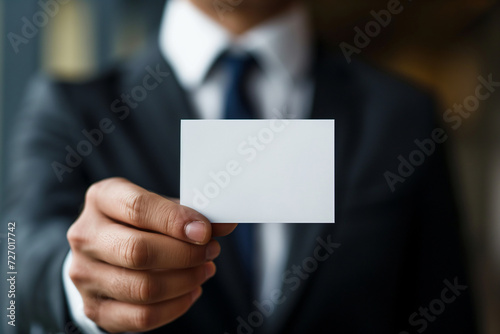 Businessman Holding Blank Card