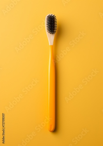 White toothbrush on a yellow background. Generative AI.